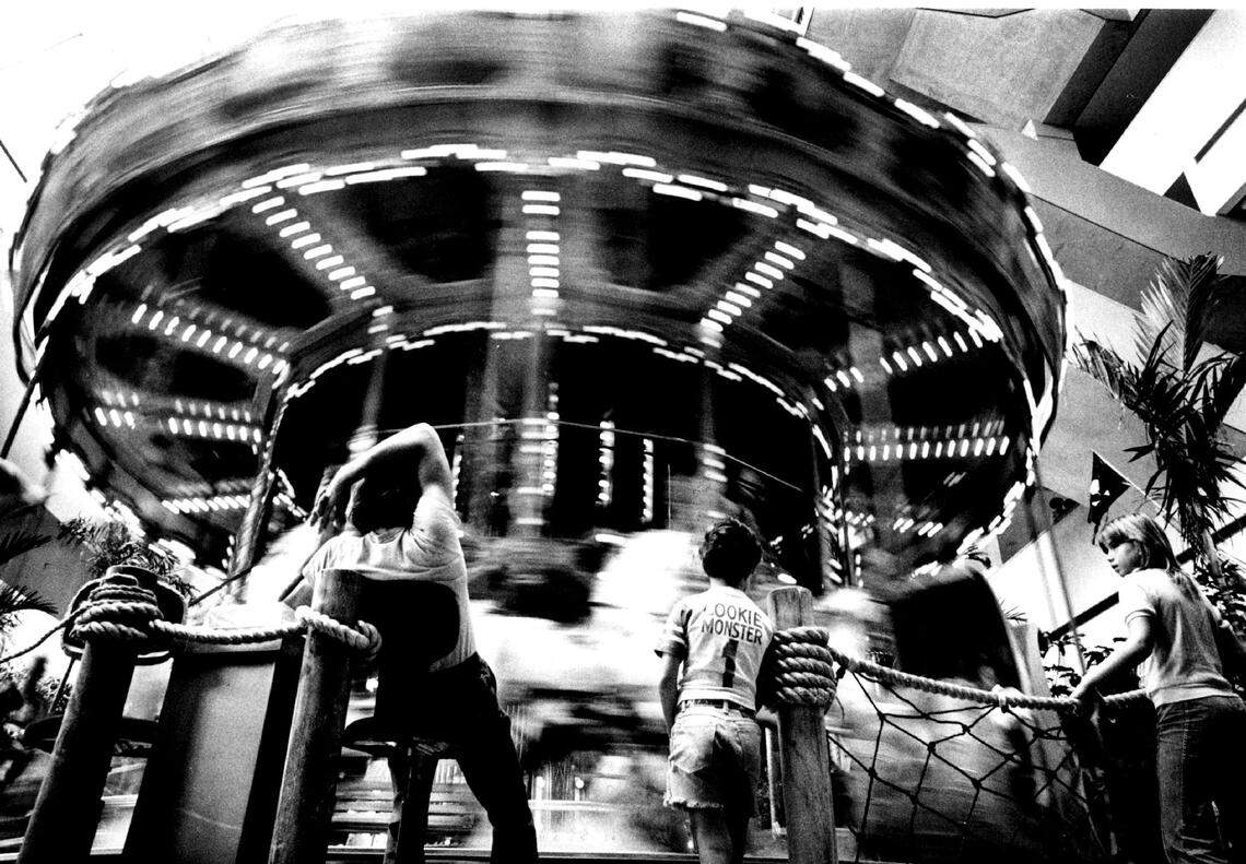 The carousel goes round at the Omni mall and hotel.