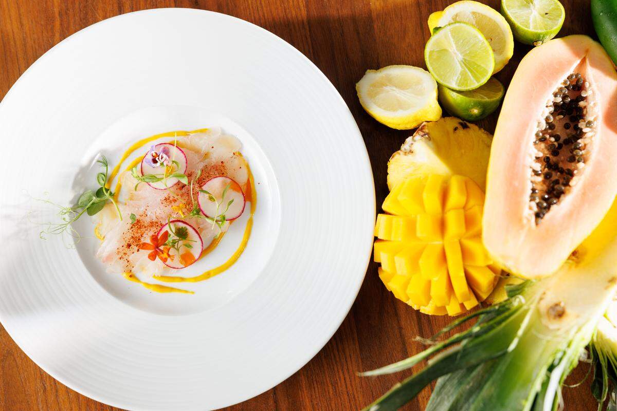 Dinner at Baleen means unforgettable flavors—think local seafood and steak—served steps from the shoreline as the sun sets over the Gulf.