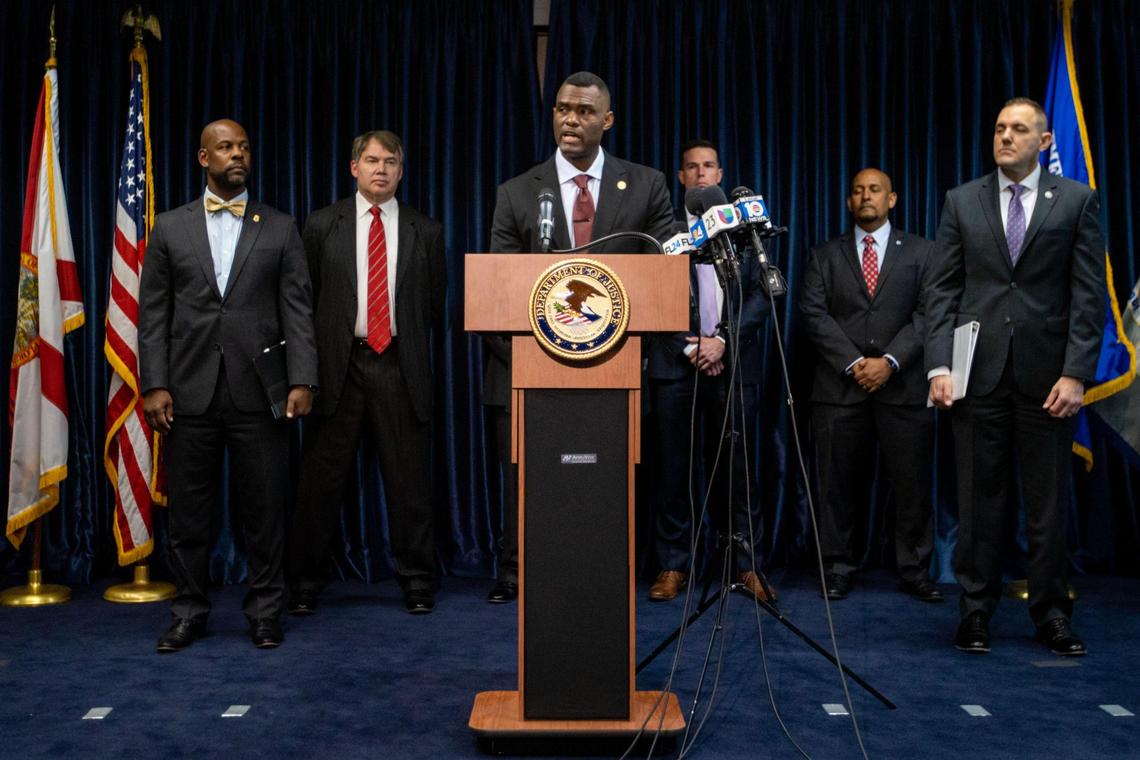 United States Attorney Markenzy Lapointe speaks to reporters in downtown Miami on Wednesday, about nursing-school operators who are based in South Florida and allegedly allowed students to buy diplomas without the proper training.