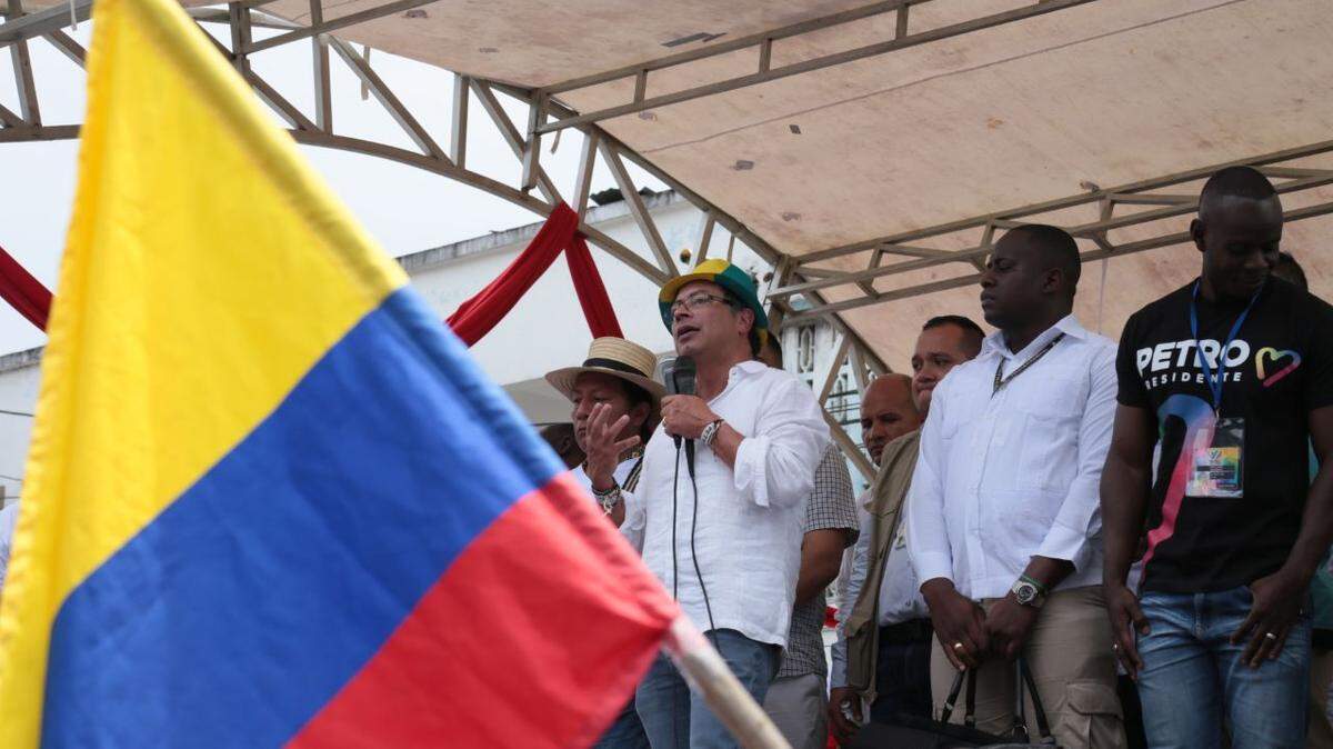 Colombian presidential candidate Gustavo Petro, center, is promising dramatic changes to the nation's drug policies. Petro is in 2nd place behind Ivan Duque in many polls. If no candidate wins half the vote in the May 27 race, the two leaders will face each other in a June 17 runoff.