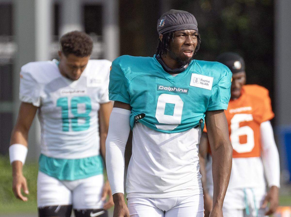 Miami Dolphins safety Ifeatu Melifonwu (9) walks out onto the field for practice at the Miami Dolphins Training Camp in Miami Gardens, Florida