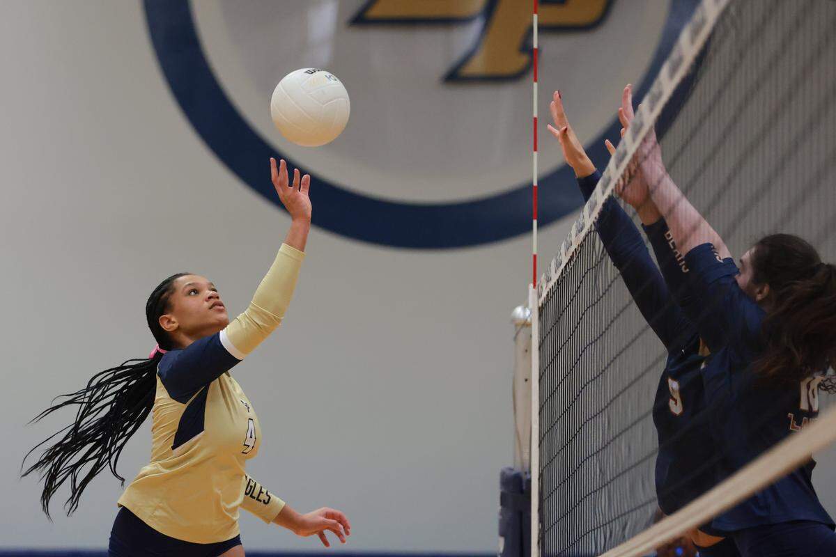 North Broward Prep outside hitter Dasia Johnson (4) hits the ball against Mater Lakes Academy during the first set of a Region 4-4A girls' volleyball regional final at North Broward Preparatory School in Coconut Creek, Florida, Wednesday, October 29, 2025.
