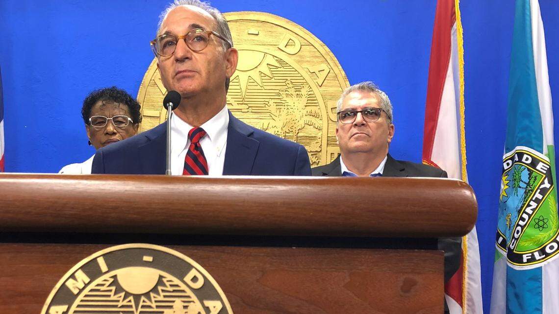 Miami-Dade Judge Steve Leifman speaks after the first meeting of a county task force on reducing the deluge of suspended licenses in Miami-Dade. Leifman serves as chairperson of the task force. Behind are members Carlos Martinez, the county’s public defender, and Barbara Jordan, a former county commissioner.