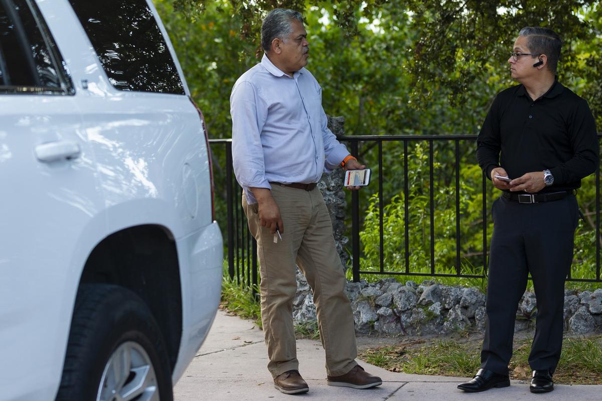 Uber drivers wait for passengers in Coral Gables on Sept. 22. Working as Uber and Lyft drivers has become the second job for many people seeking to complete their monthly income.
