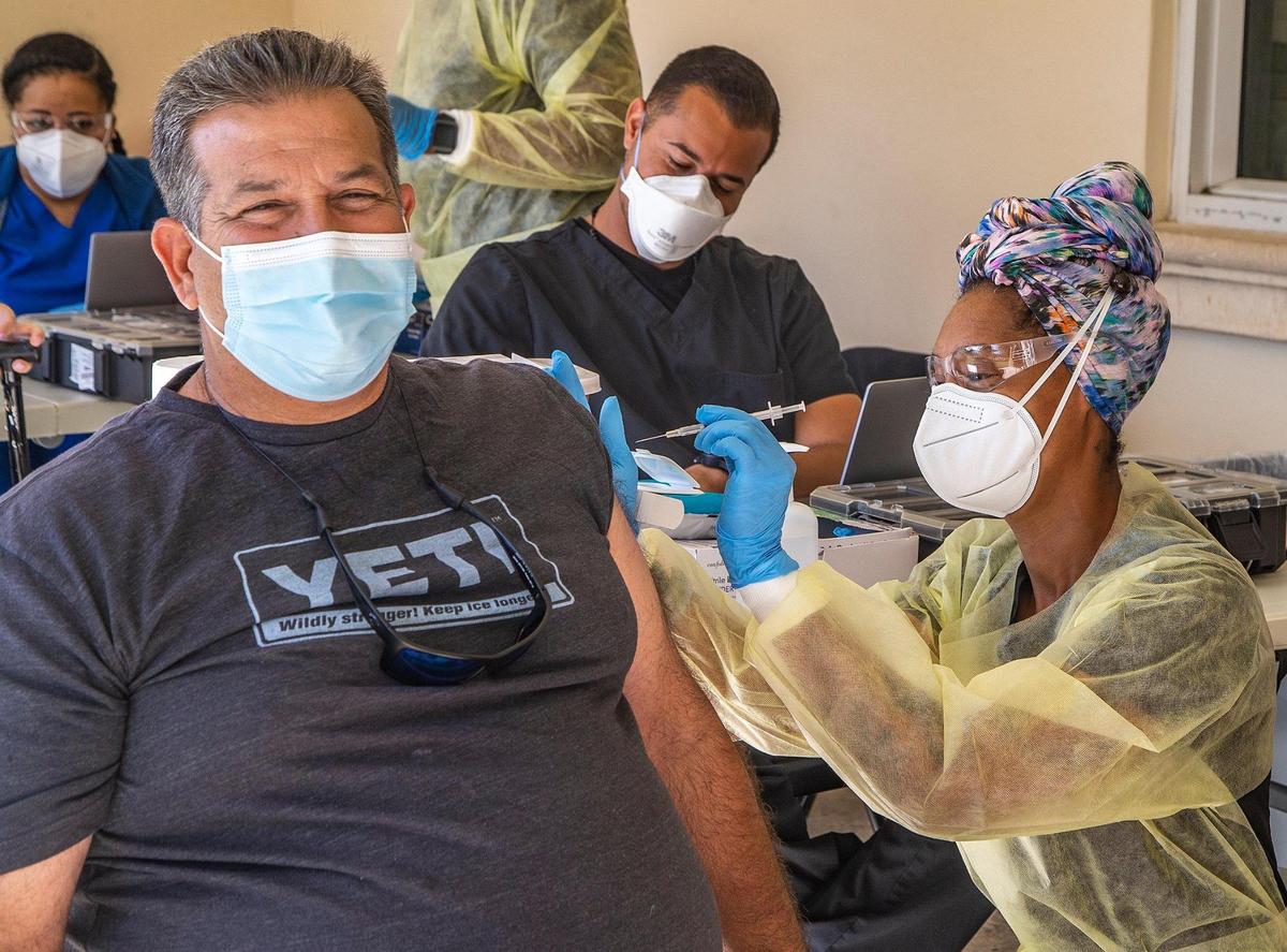 Miami resident Pedro Bermudez gets vaccinated at South Miami Children’s Clinic on Saturday, March 20, 2021.