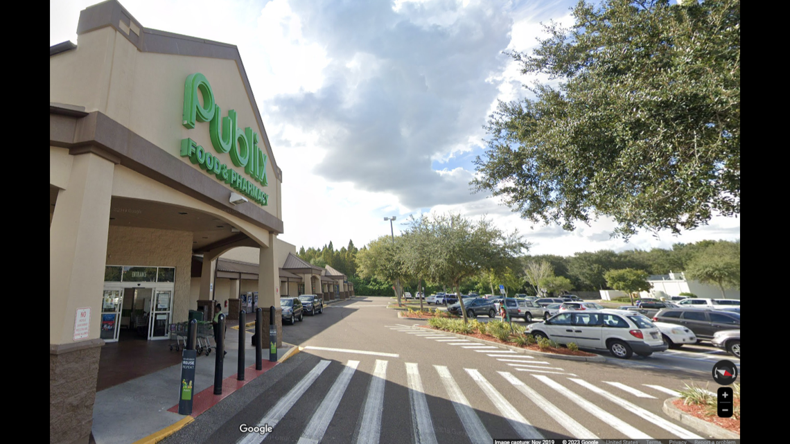 A woman was outside a Publix when she was approached by a man and knocked down, Florida deputies said.