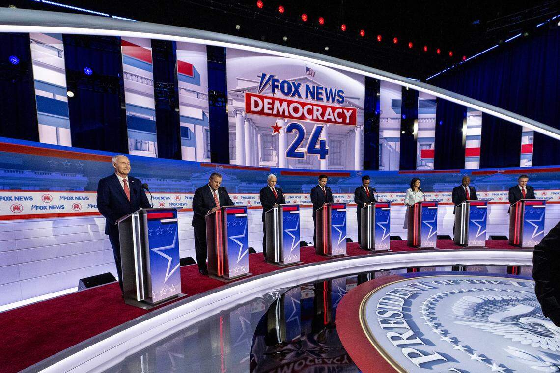 Former Arkansas Gov. Asa Hutchinson, Former New Jersey Gov. Chris Christie, Former Vice President Mike Pence, Florida Gov. Ron DeSantis, Vivek Ramaswamy, Former United Nations Ambassador Nikki Haley, Sen. Tim Scott of South Carolina, and North Dakota Gov. Doug Burgum take the stage at the Fiserv Forum for the first Republican Presidential primary debate in Milwaukee, Wisconsin, on August 23, 2023.