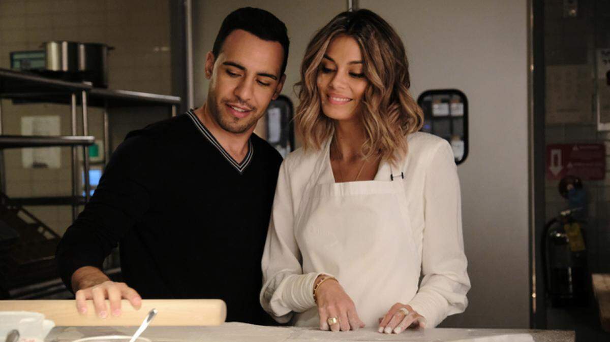 Victor Rasuk and Nathalie Kelley in a scene from “Baker and the Beauty”