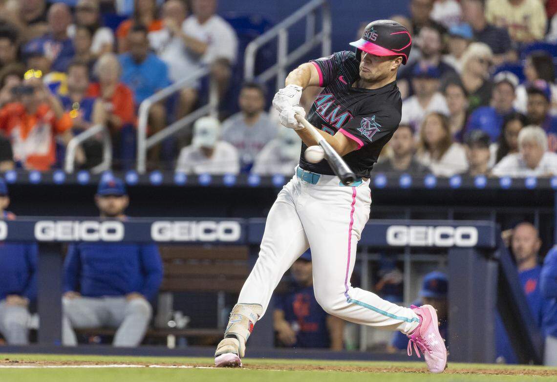 Miami Marlins outfielder Jakob Marsee (87) hits a ground ball against the New York Mets in the third inning of their MLB game at loanDepot park on Saturday, Sept. 27, 2025, in Miami, Fla.