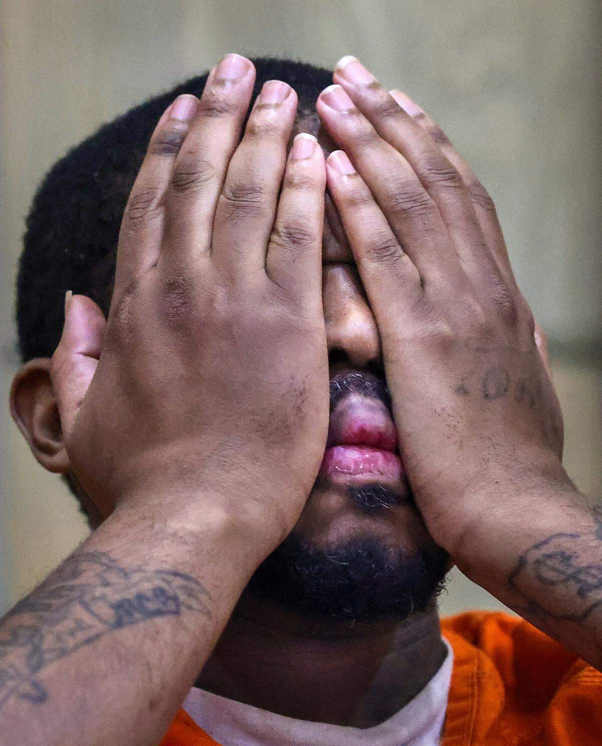 Anthawn Ragan Jr., who went on a murder and robbery spree in 2013, runs his hands over his face as Hai Vu testified about the robbery that killed his son. Ragan appeared in Courtroom 4-6 for his death penalty sentencing for the killing of a 10-year-old boy during a nail salon robbery on Monday, February 9, 2026, at the Richard E. Gerstein Justice Building in Miami, Florida. Ragan waived his right to a jury trial, meaning Miami-Dade Circuit Court Judge Marisa Tinkler Mendez will decide on whether he gets life or death.
