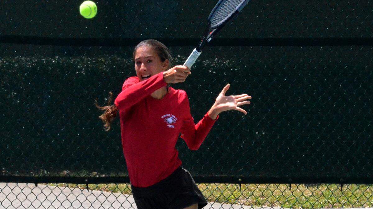 Cadence Brace, from Stoneman Douglas, places her shot during FHSAA Class 4A girls overall doubles state championship match on Friday at Sandlando Park in Altamonte Springs. Brace won the overall singles title earlier in the day by injury default.