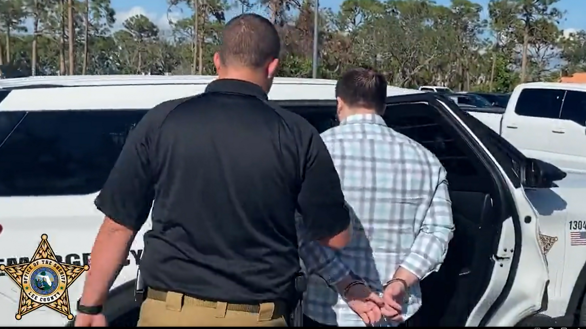 Two correction officers in Lee County, Florida, are accused of scalding three inmates with hot water, the sheriff says.