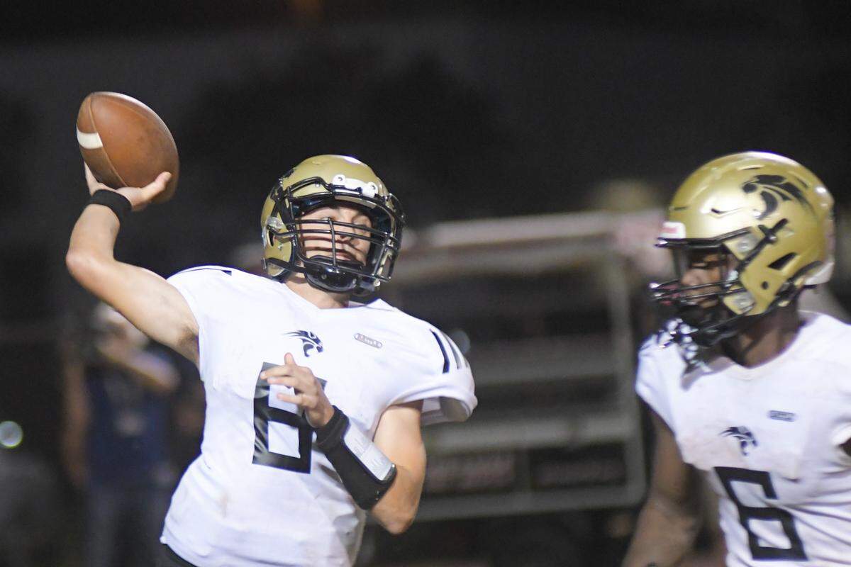 Davie Western quarterback Collin Hurst throws against Miramar in a high school football game on Friday, Nov. 5, 2021.