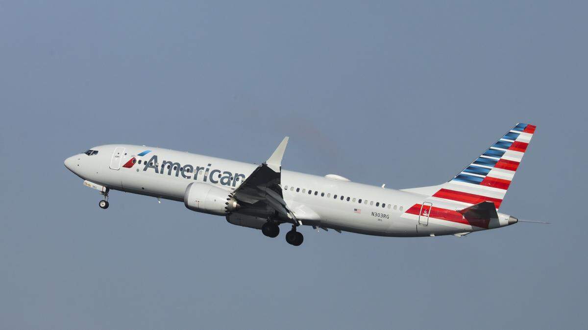 An American Airlines Boeing 737 Max 8, on a flight from Miami to New York City, prepares to land at LaGuardia Airport on Monday, a day after a second deadly crash involving the newest version of Boeing’s most popular jetliner.