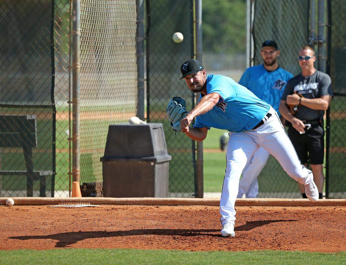 Miami Marlins pitcher Caleb Smith (31) pitches during practice before the start of a Major League Baseball spring training game against the New York Mets at the Roger Dean Chevrolet Stadium on Tuesday, March 5, 2019 in Jupiter, FL.