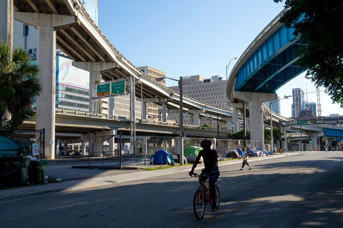 A view of encampments near the sidewalk near Southwest 2nd Avenue and Second Street in Downtown Miami, Florida, on Sunday, October 17, 2021.