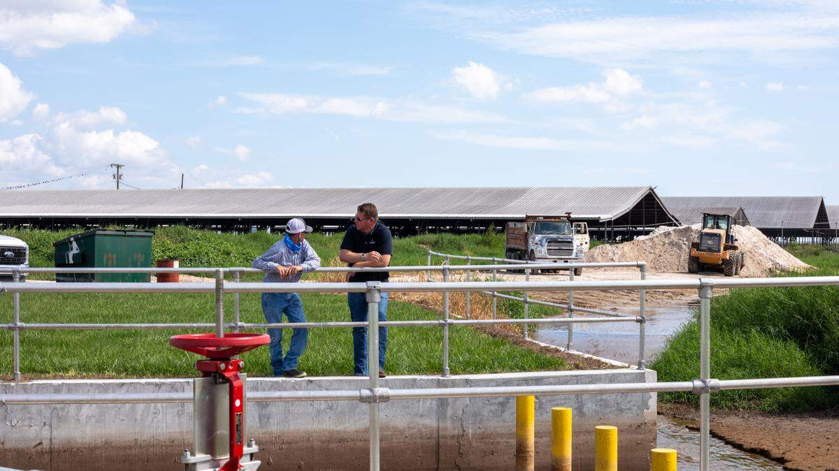 Liquified cow manure at an Okeechobee farm flows from the barn stalls into an anerobic digester lagoon where it turns into renewable natural gas (RNG). A new bill being considered by Florida lawmakers would pass on the costs of building infrastructure like anerobic digesters to consumers.