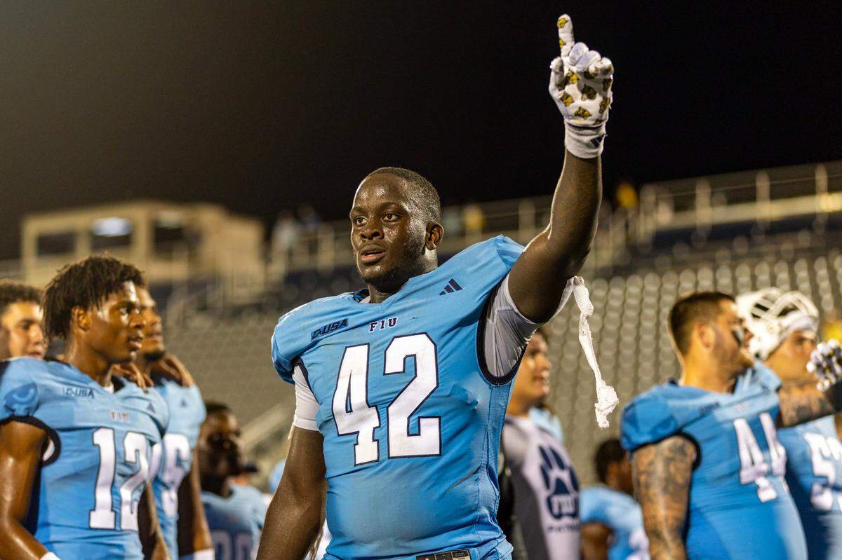 Florida International University linebacker Reggie Peterson (42) reacts to defeating University of North Texas 46-39 during the second half of a college football game at Riccardo Silva Stadium in Miami, Florida, on Saturday, September 9, 2023.