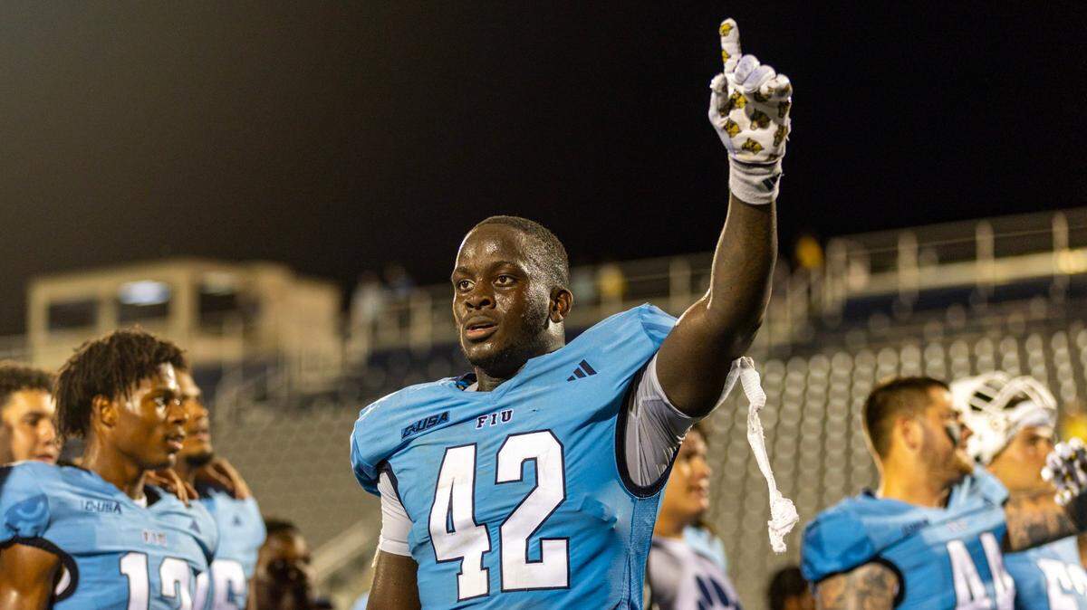 Florida International University linebacker Reggie Peterson (42) reacts to defeating University of North Texas 46-39 during the second half of a college football game at Riccardo Silva Stadium in Miami, Florida, on Saturday, September 9, 2023.