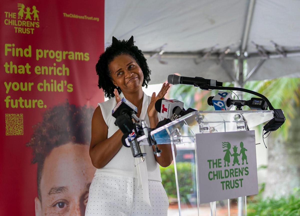 Ann Lauren Lopez reacts during a press conference hosted by The Children’s Trust at the Opa-locka Community Development Corporation Alice Brown Apartments on Tuesday, June 14, 2022, in Opa-locka. The Children’s Trust announced its board approved a $14 million investment in its Family and Neighborhood Support Partnerships, which will help South Florida families in need.