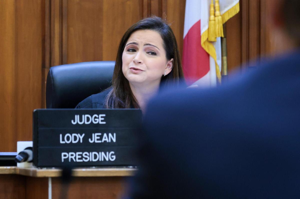 Miami-Dade Circuit Court Judge Lody Jean, left, Courtroom 2-2, addresses the bond issue with attorneys during the bond hearing at the Richard E. Gerstein Justice Building in Miami, Florida on Monday, December 16, 2024. Oren and Alon Alexander, two of the three brothers who are accused in a sexual assault investigation involving dozens of victims violently raped as far back as over a decade ago in South Florida and New York, did not appear in court for their hearing. The hearing was pushed back till Thursday, December 19, 2024.