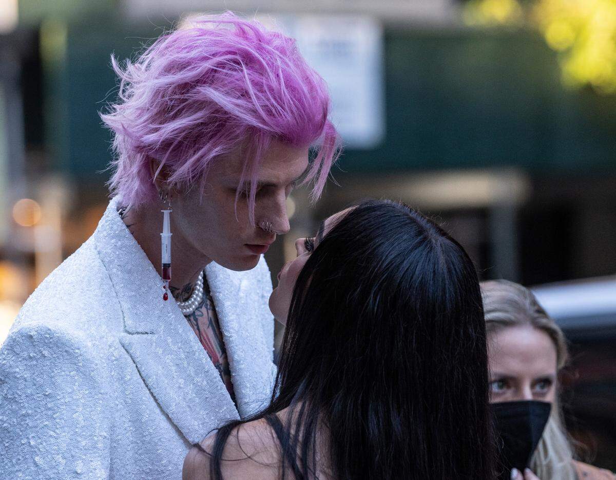 Megan Fox and Machine Gun Kelly share a moment together.