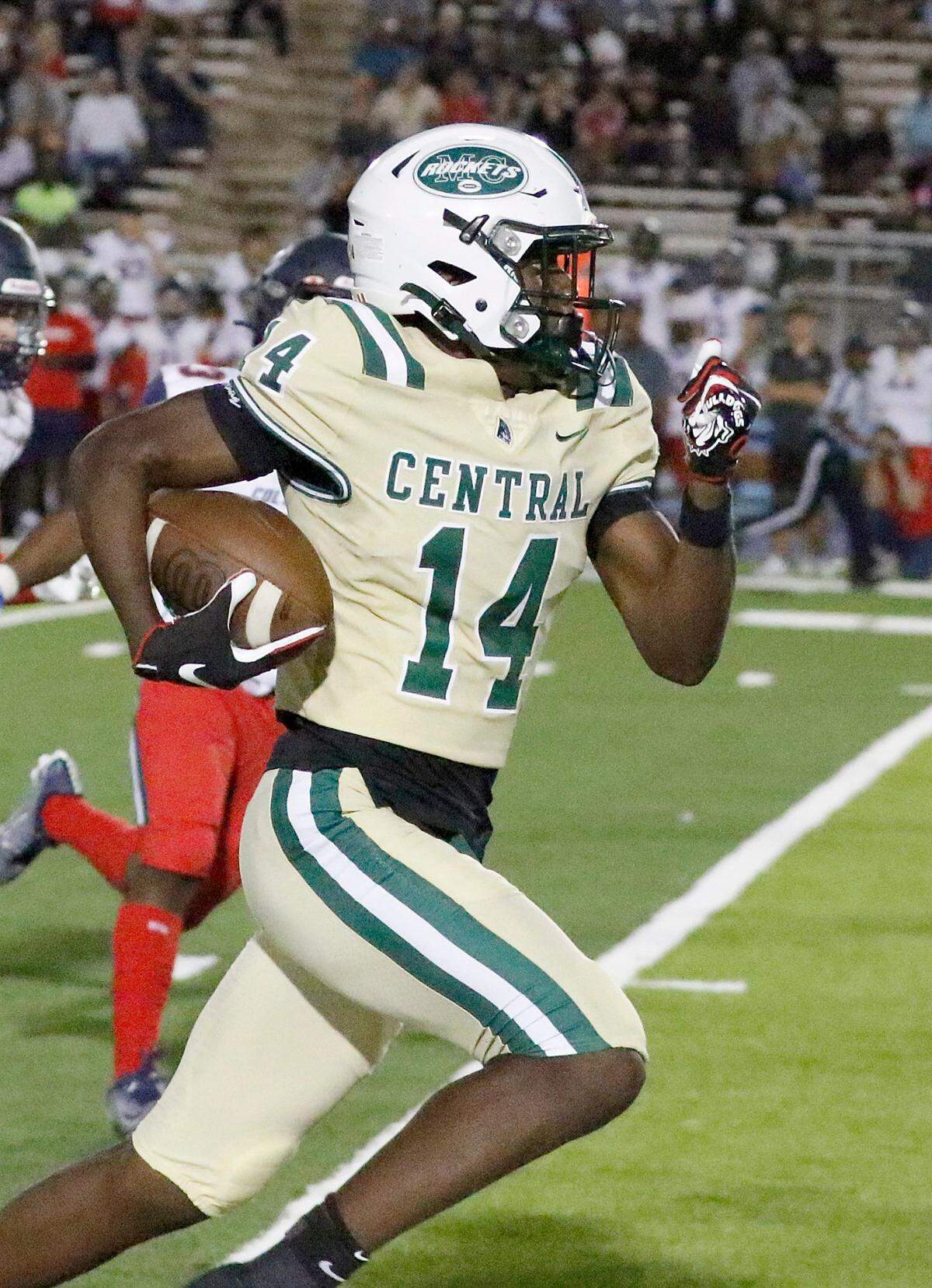 Miami Central Rockets wide receiver Lamar Seymore (14) carries the ball against Columbus Explorers during football game on Friday, October 21, 2022 at Traz Powell Stadium in Miami. Andrew Uloza / for Miami Herald