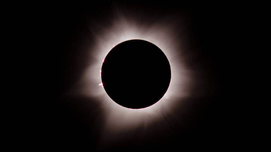 Hybrid solar eclipse passed over Australia and southeast Asia, wowing viewers and scaring birds. Photos, videos show “extraordinary” sight.