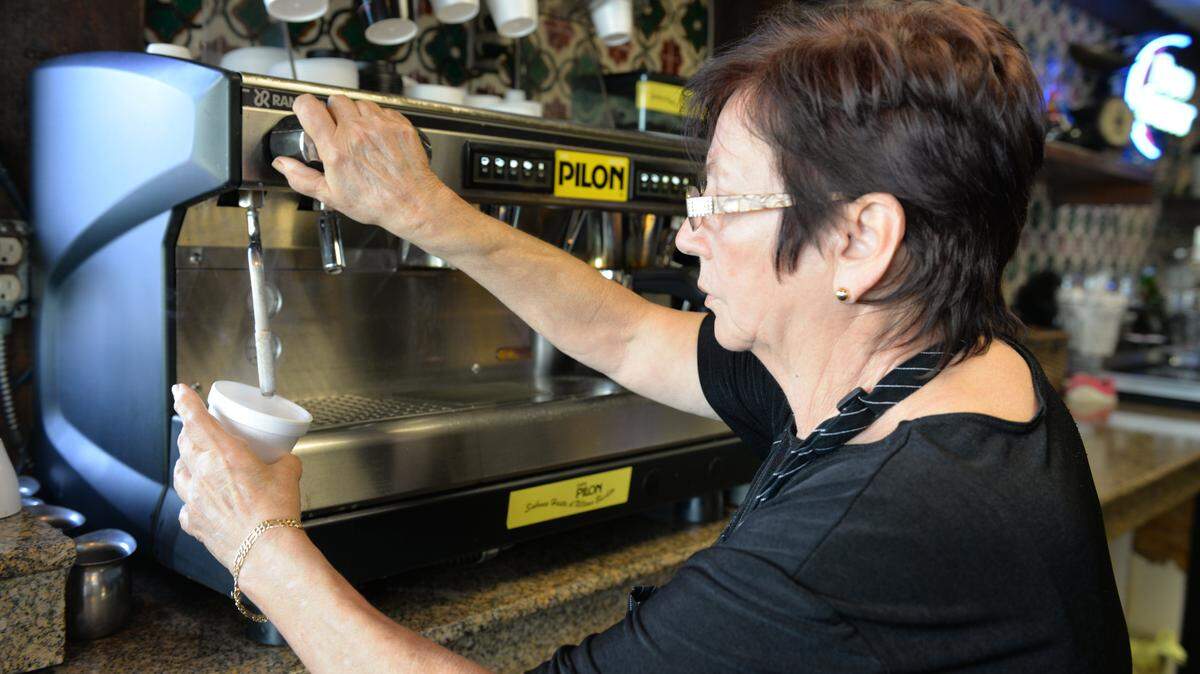 Iris Dalia Diaz, who has been working at la ventanita, the coffee window, at Sergio’s since 1987.