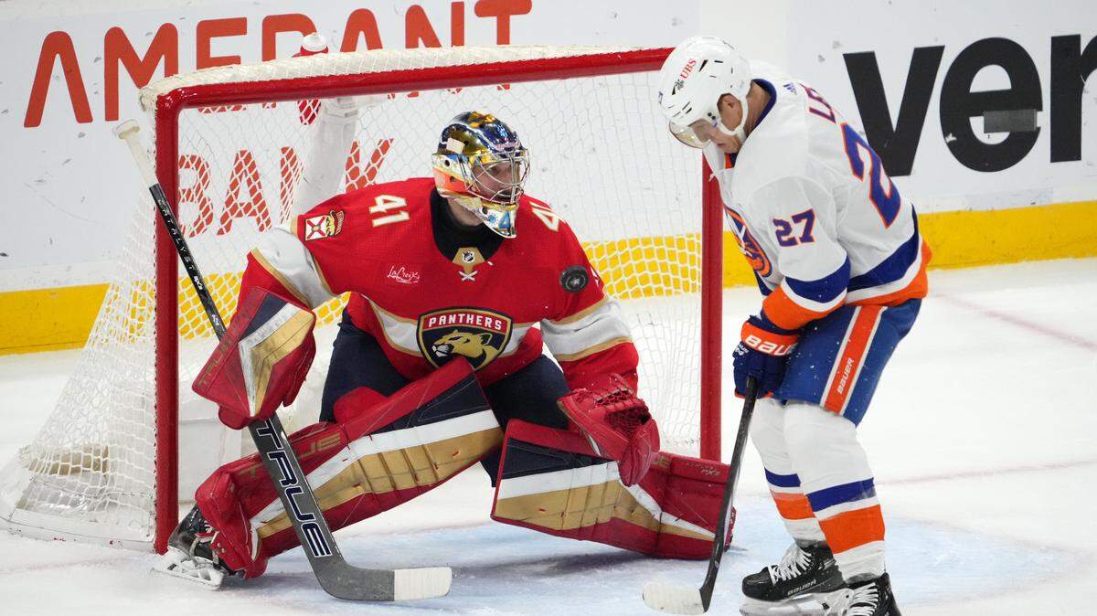 Dec 2, 2023; Sunrise, Florida, USA; Florida Panthers goaltender Anthony Stolarz (41) blocks the shot of New York Islanders left wing Anders Lee (27) during the second period at Amerant Bank Arena.
