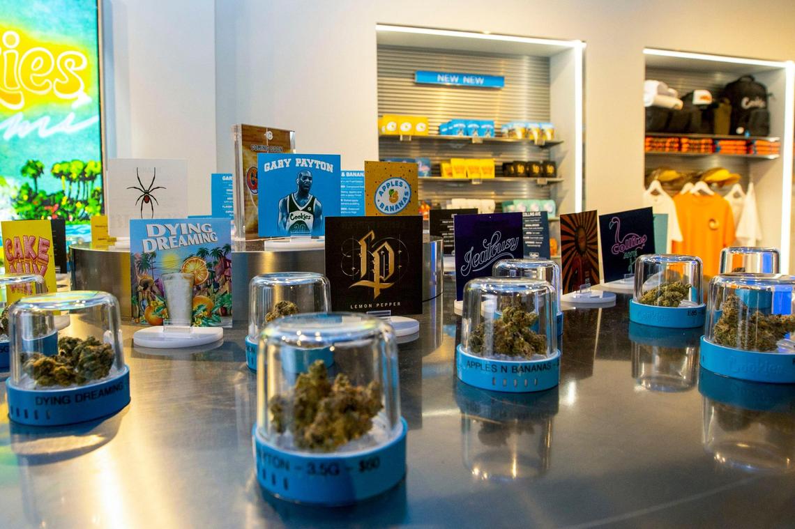 Different strains of marijuana sit inside display pods for the grand opening of Cookies Miami, Florida’s first and only minority-owned marijuana dispensary, in Miami on Saturday, Aug. 13, 2022.