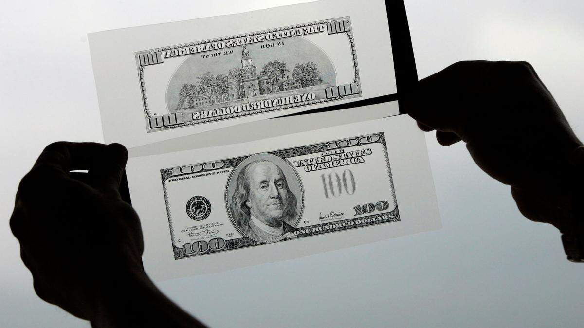 A North Carolina man and woman tried creating fake $100 bills, federal prosecutors say.