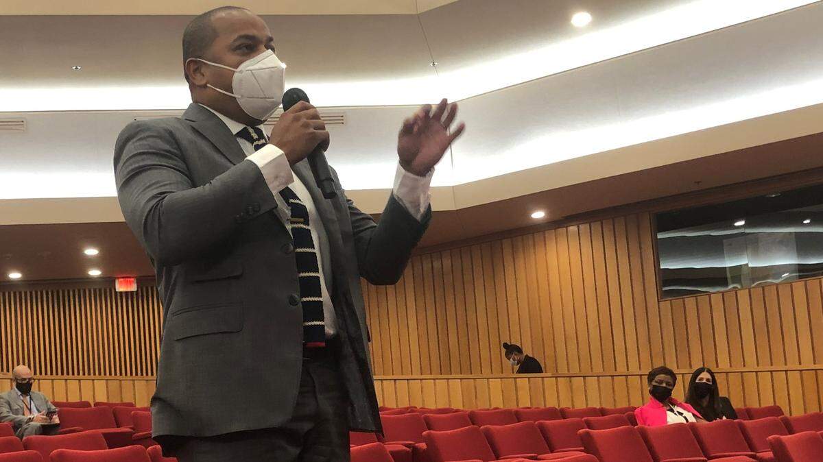 Miami-Dade Commissioner Keon Hardemon speaks from the second row of the commission chambers on Tuesday, Oct. 19, 2021, to demonstrate how far away citizens would need to stand back from police under state legislation the board was asked to endorse. The resolution endorsing the House Bill 11 failed.