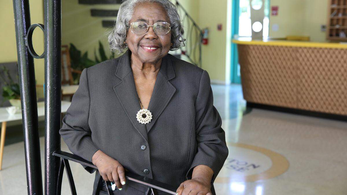 Historian and civil rights activist Enid Pinkney in the lobby of the historic Hampton House hotel in Brownsville, which she led the fight to save. Pinkney will be celebrating her 88th birthday Nov. 10 at the Hampton House, and a portion of the ticket proceeds will go toward the Historic Hampton House Community Trust, Inc.