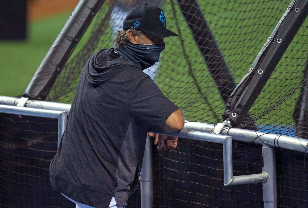 Miami Marlins manager Don Mattingly looks on during practice before the start of a baseball game against the Toronto Blue Jays at at Marlins Park in Miami on Wednesday, September 2, 2020.