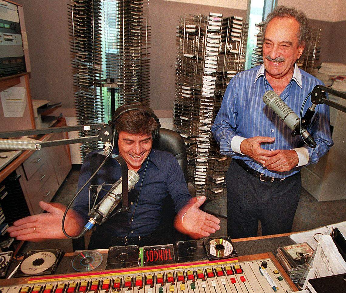 Comedian Guillermo ALvarez-Guedes jokes around with DJ. Adrian Mesa at the studio during his FM radio show in Sept. 29, 2000.