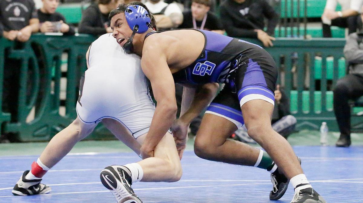 South Dade Elvis Solis wrestles Miami Southridge Andres Rojas during 2025 GMAC 144 lb weight wrestling final match on Saturday, February 8, 2025 at Miami Central HS in Miami. Andrew Uloza / for Miami Herald