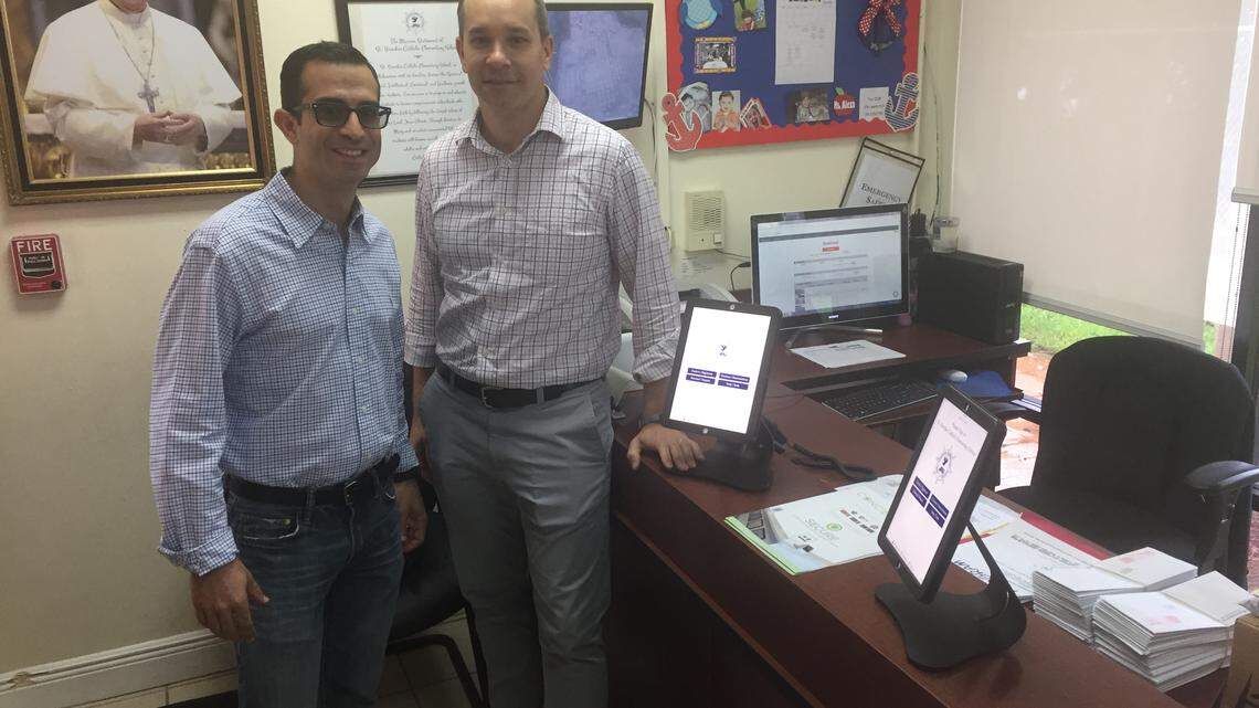 CONCIERGEpad founder and CEO Rene Perez, left, with Frank Porro, COO. The app is now in about 250 schools nationwide.