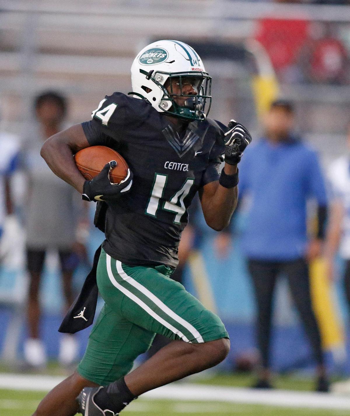 Miami Central Rockets wide receiver Lamar Seymore (14) gains yardage against Dillard Panthers during football game on Saturday, September 24, 2022 at Traz Powell Stadium in Miami. Andrew Uloza / for Miami Herald