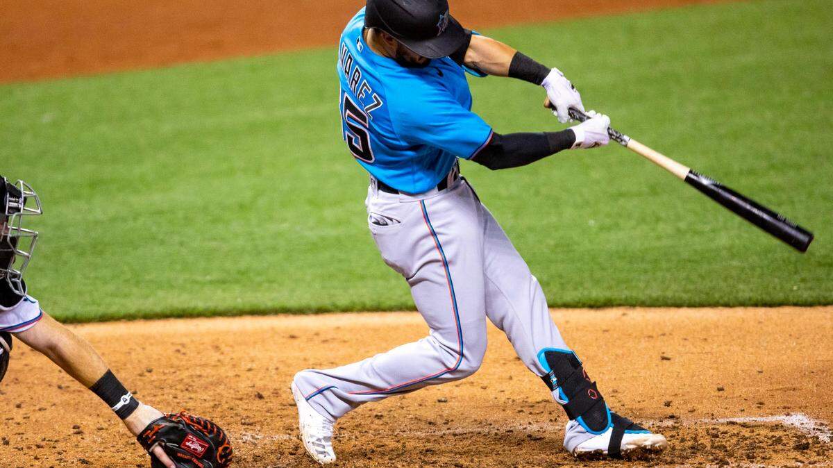 Marlins short stop Eddy Alvarez swings at a pitch during a simulation game at Marlins Park in Miami, Florida on Friday, July 10, 2020.