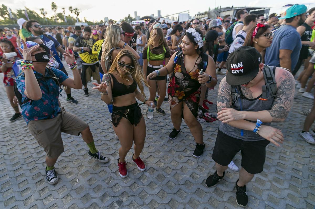 Festival goers enjoy music during the 2019 Ultra Music Festival in Virginia Key, Florida on Friday, March 29, 2019.