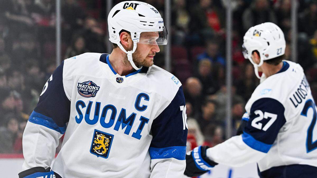 Feb 13, 2025; Montreal, Quebec, CAN; Team Finland forward Aleksander Barkov (16) looks on in warm-up before the game against Team USA during a 4 Nations Face-Off ice hockey game at Bell Centre.