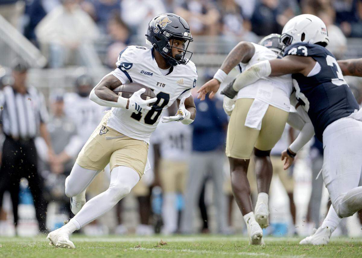 FIU wide receiver Jojo Stone cuts down the field with the ball during the game against Penn State on Saturday, Sept. 6, 2025 at Beaver Stadium.