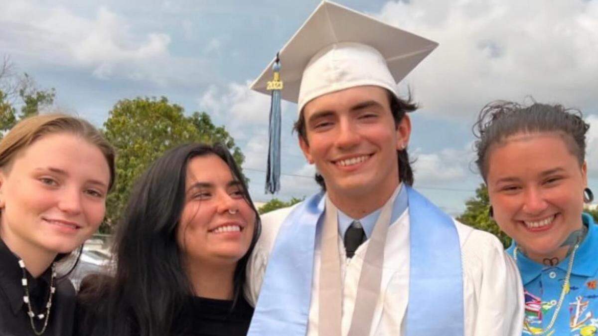 Victor Castaneda and his sisters at his graduation from Somerset Academy Charter High School in Princeton in south Miami-Dade.
