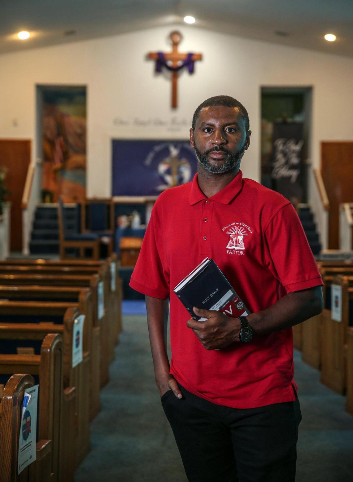 The Rev. Willie F. Ford Jr., pastor at St. Matthew Community Missionary Baptist Church in Miami’s historically Black Coconut Grove, poses in the sanctuary on June 15. ‘If you haven’t been here in a while, you don’t recognize where you are,’ Ford said.