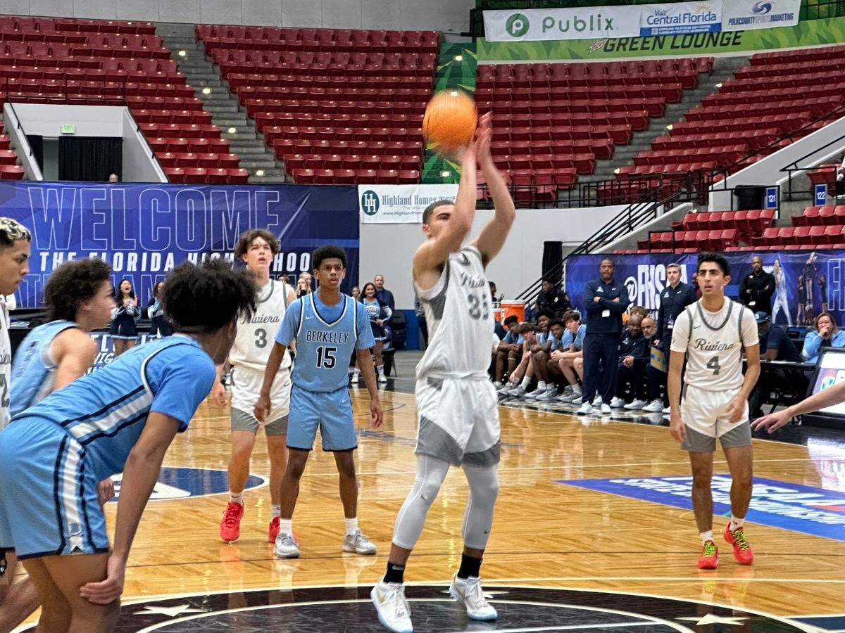 Riviera Prep guard Dante Allen hoists up the game-winning free throw with 3.2 seconds left to help the Bulldogs beat Tampa Berkeley Prep on Wednesday at the RP Funding Center in Lakeland, Fla.