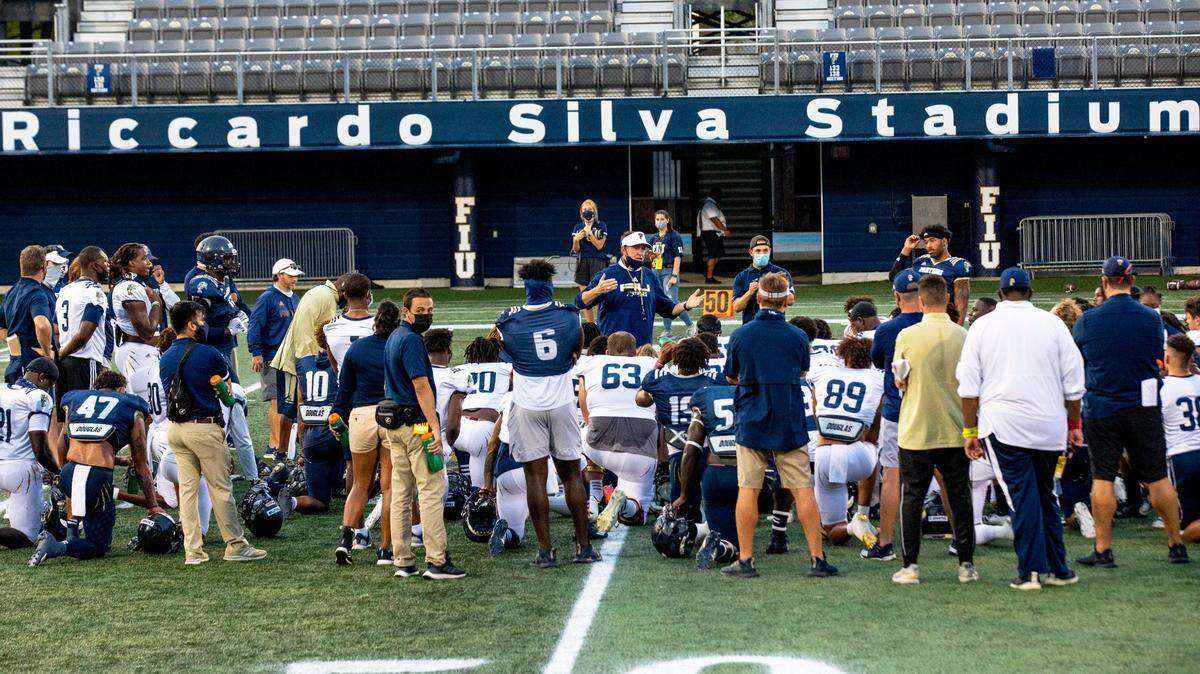 Florida International University Head Coach Butch Davis speaks to players following the Annual FIU Football Spring Showcase at Riccardo Silva Stadium in Miami, Florida, on Friday, April 16, 2021.