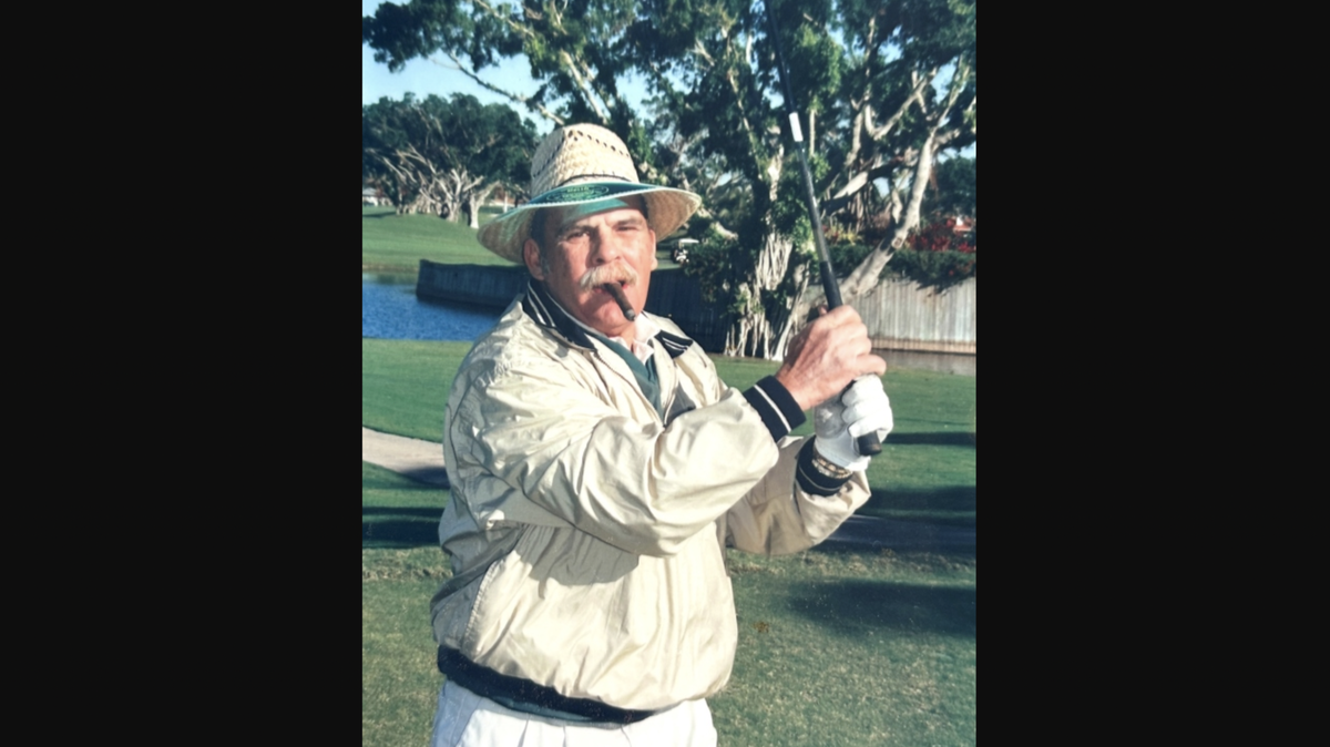 Dennis Mello was known to always have his straw hat and a cigar on him.