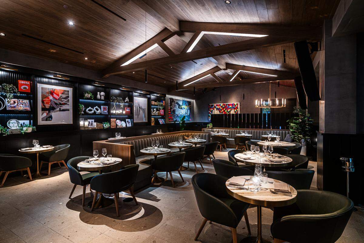 The dramatic Amalfi Llama restaurant in Aventura features live-fire cooking and Patagonian and Italian cuisine.