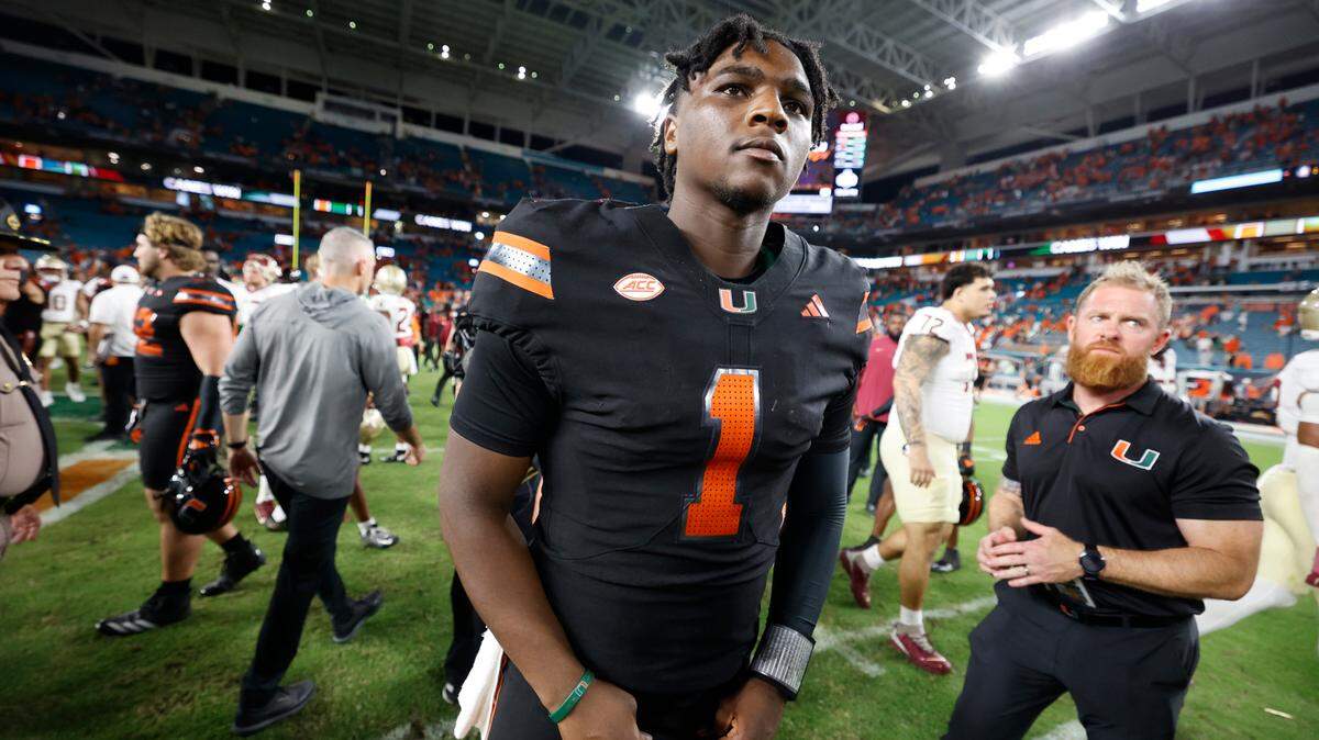 Miami Hurricanes quarterback Cam Ward (1) walks off the field after the Canes defeat the Florida State Seminoles in the during an NCAA football game at Hard Rock Stadium in Miami Garden, Florida on Saturday, October 26, 2024.